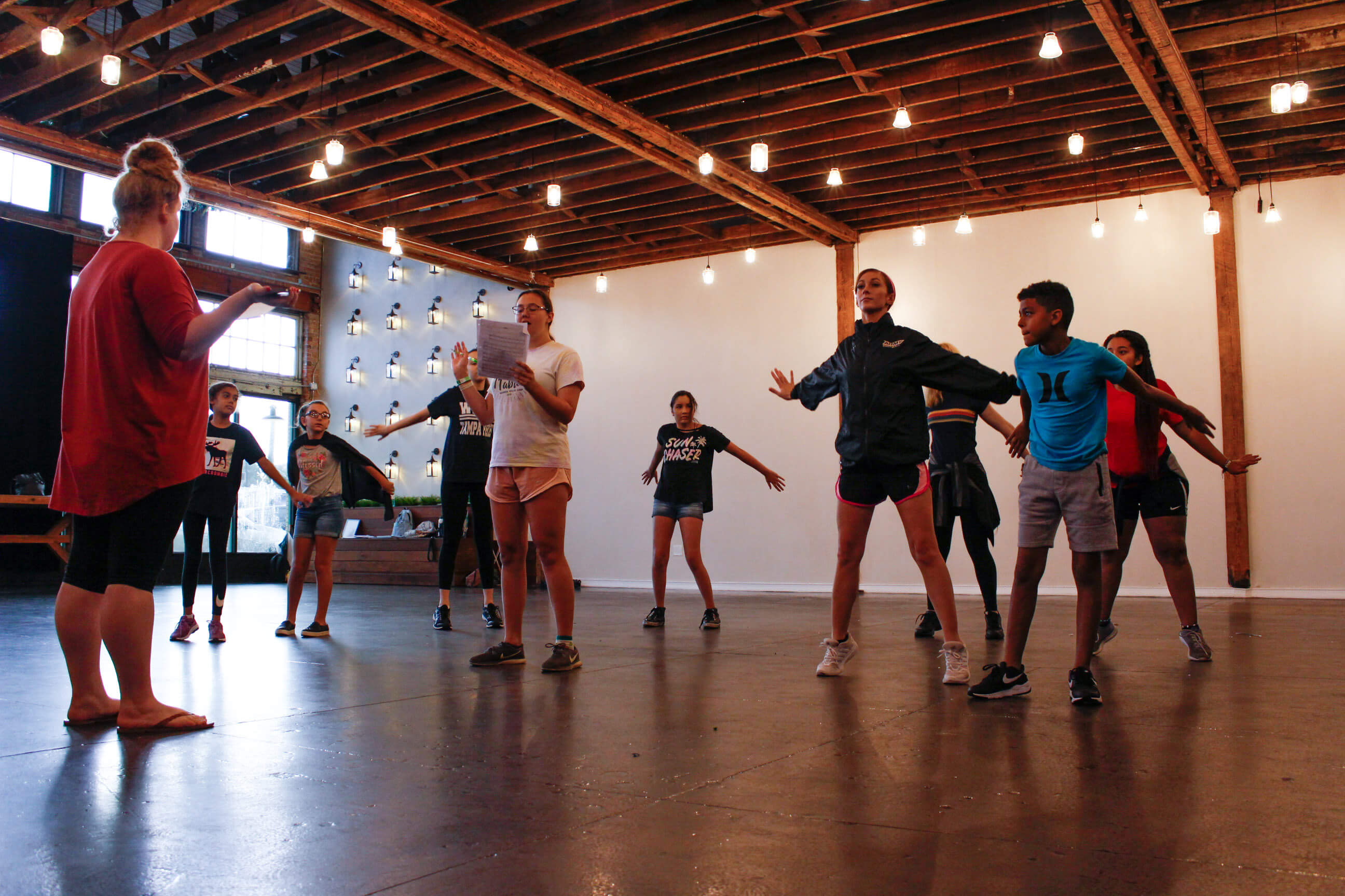 happy students participating in musical theater classes in New York