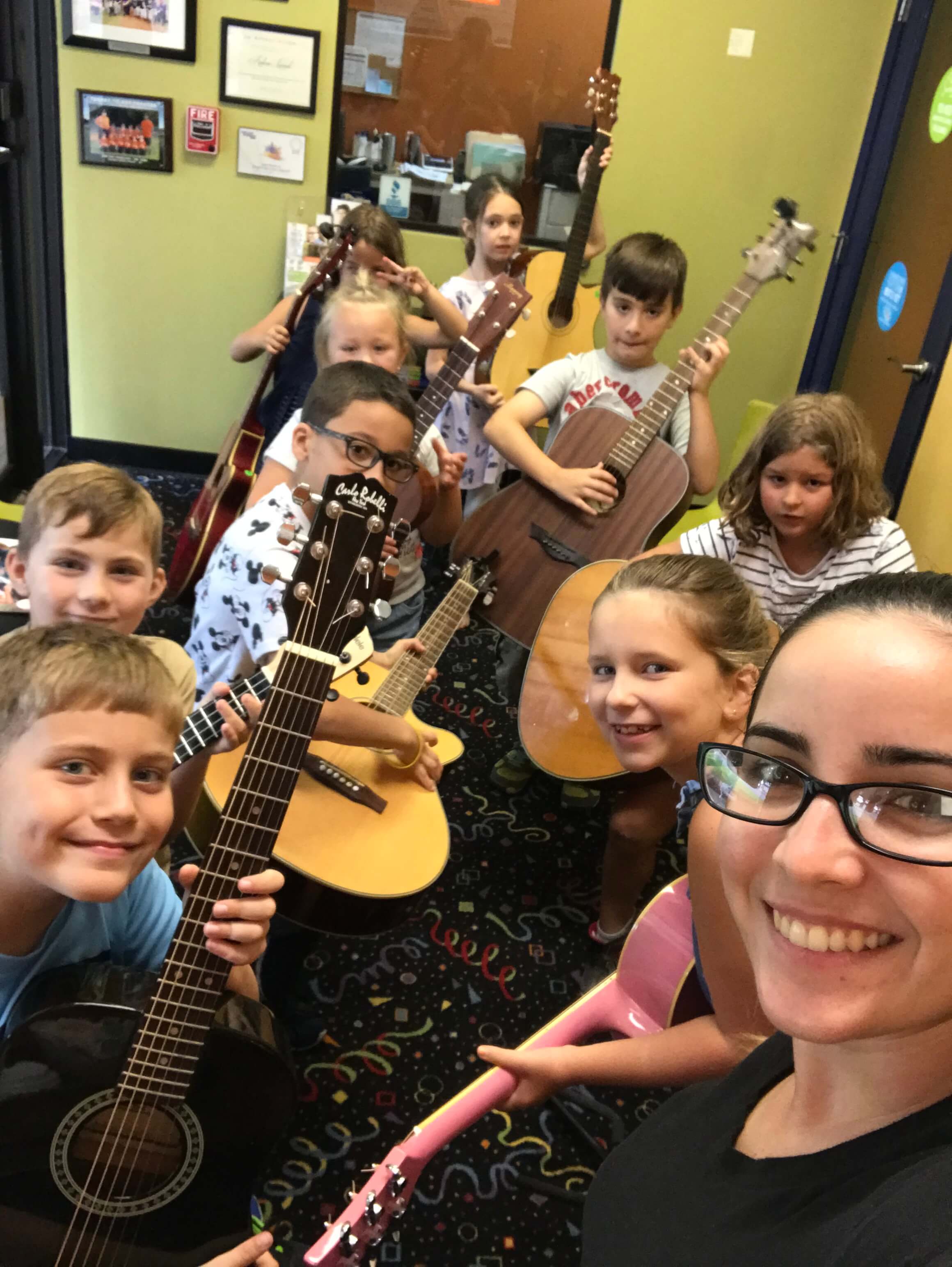 happy students at our music school in New York